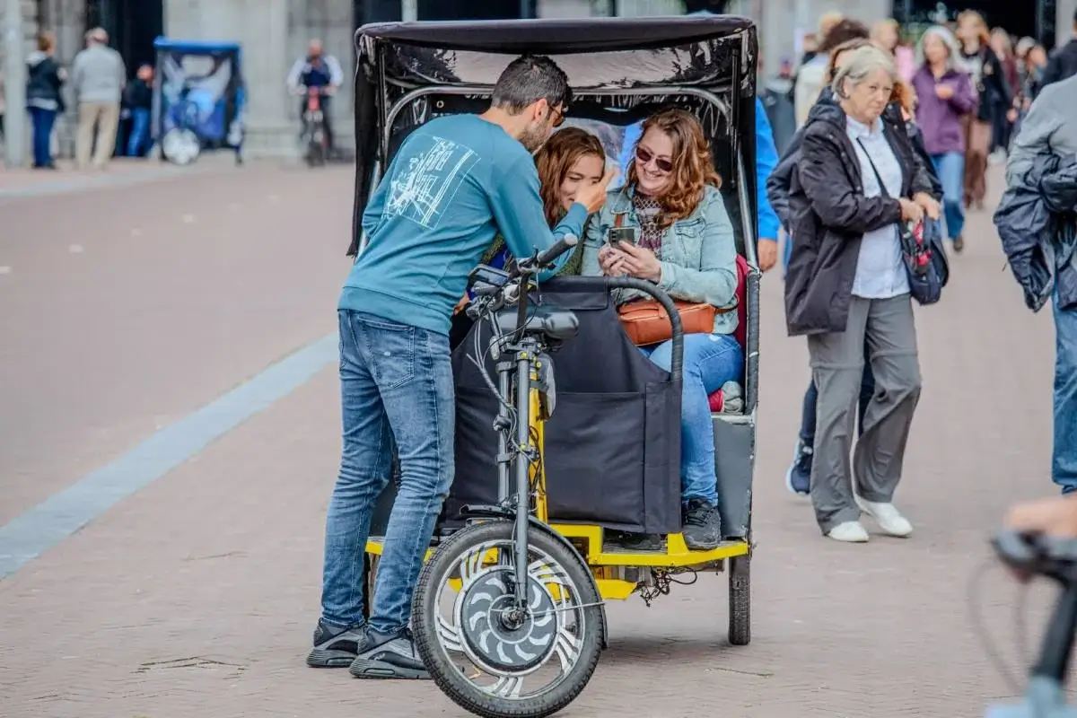Dutch ladies on pedicab fun ride