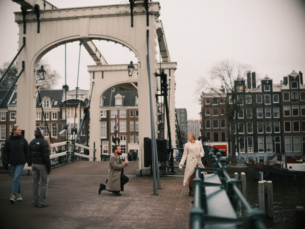 Magere Brug Amsterdam – Romantic Skinny Bridge Proposal Romantic proposal at Magere Brug Skinny Bridge in Amsterdam at sunset