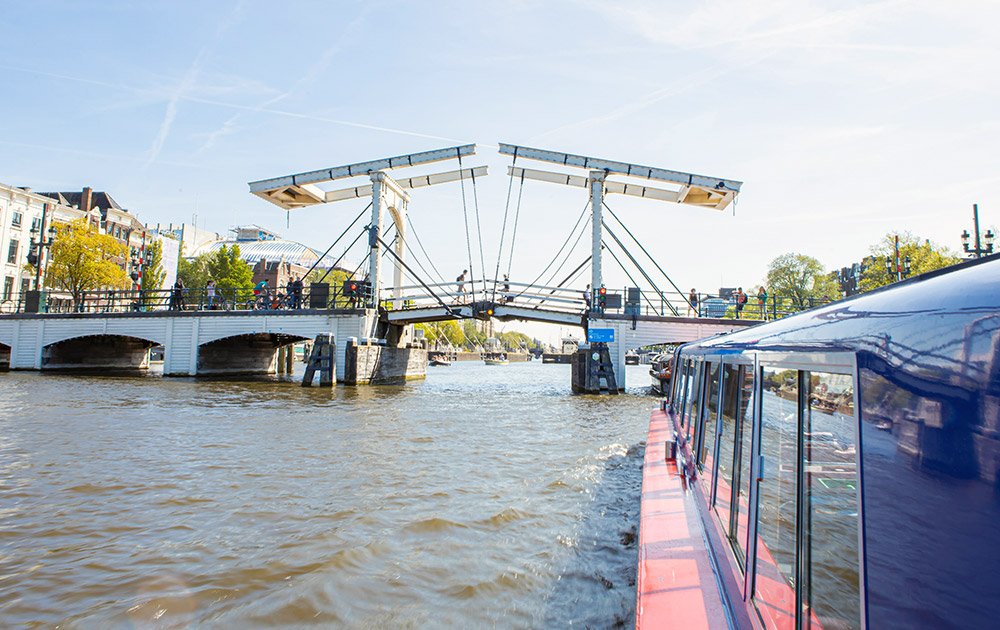  Magere Brug skinny bridge at sunset over Amstel canal Amsterdam